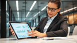 Business analyst reviewing financial reports and strategies for IIII growth in a professional